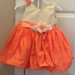 A cute orange golden polka dots frock hardlywore